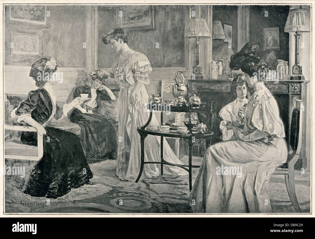 SOCIAL/LADY AT HOME 1907 Stock Photo