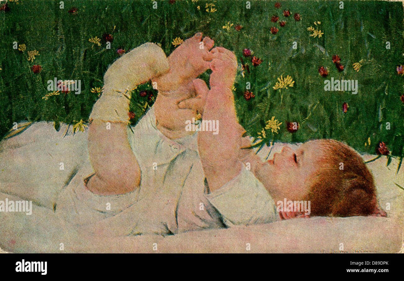 BABY DISCOVERS TOES 1905 Stock Photo Alamy