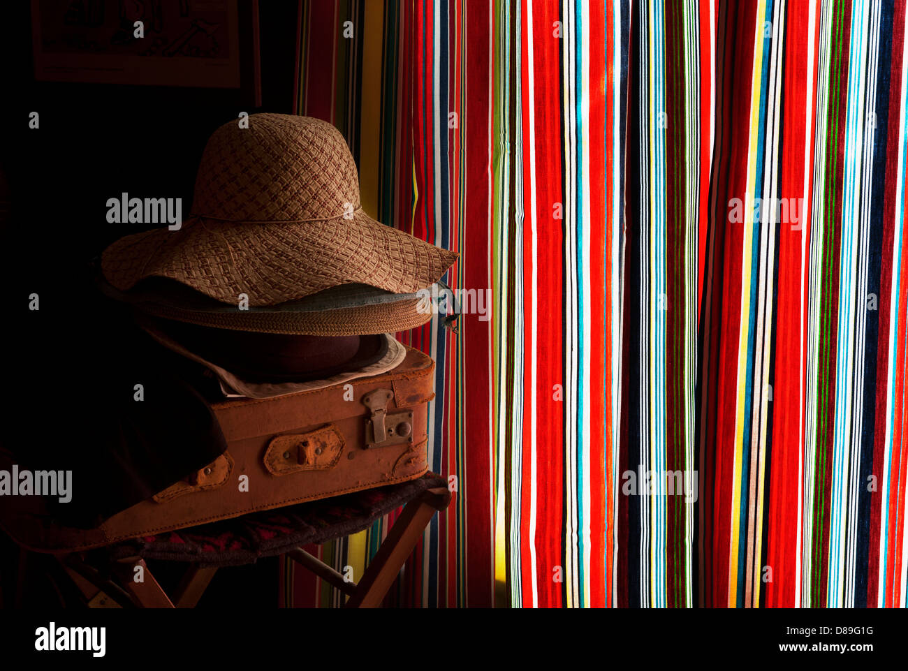 Stripes and Hats and Case, Thaxted,Essex,England,UK. May 2013 Seen in the photographers bedroom. Stock Photo