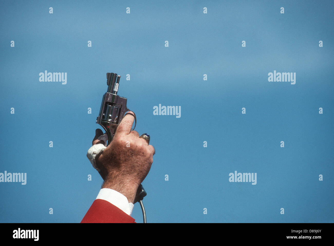Detail of f track and field relay starter's pistol Stock Photo Alamy