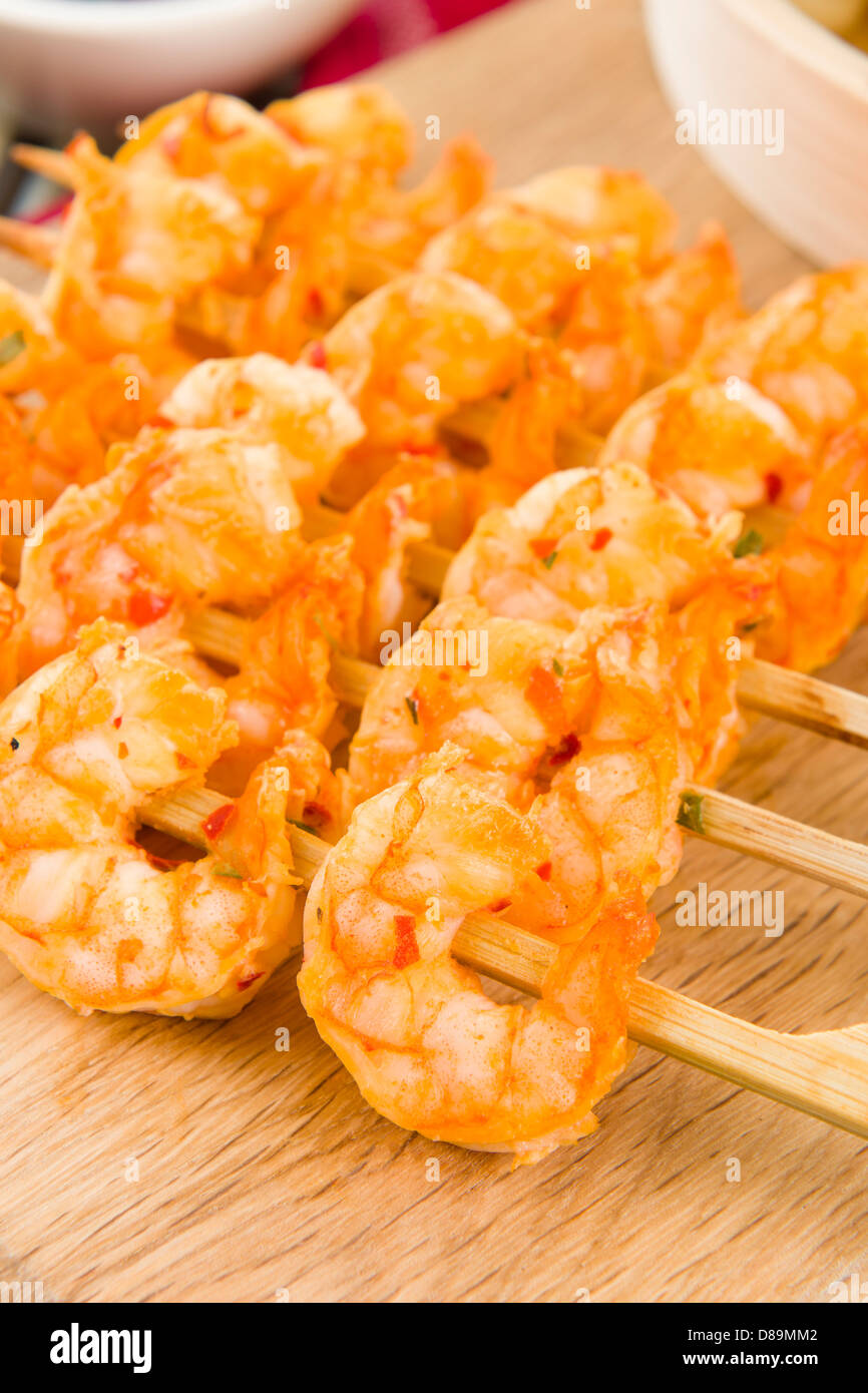 Sate Goong - Thai prawn satays served with peanut sauce. Close up. Stock Photo