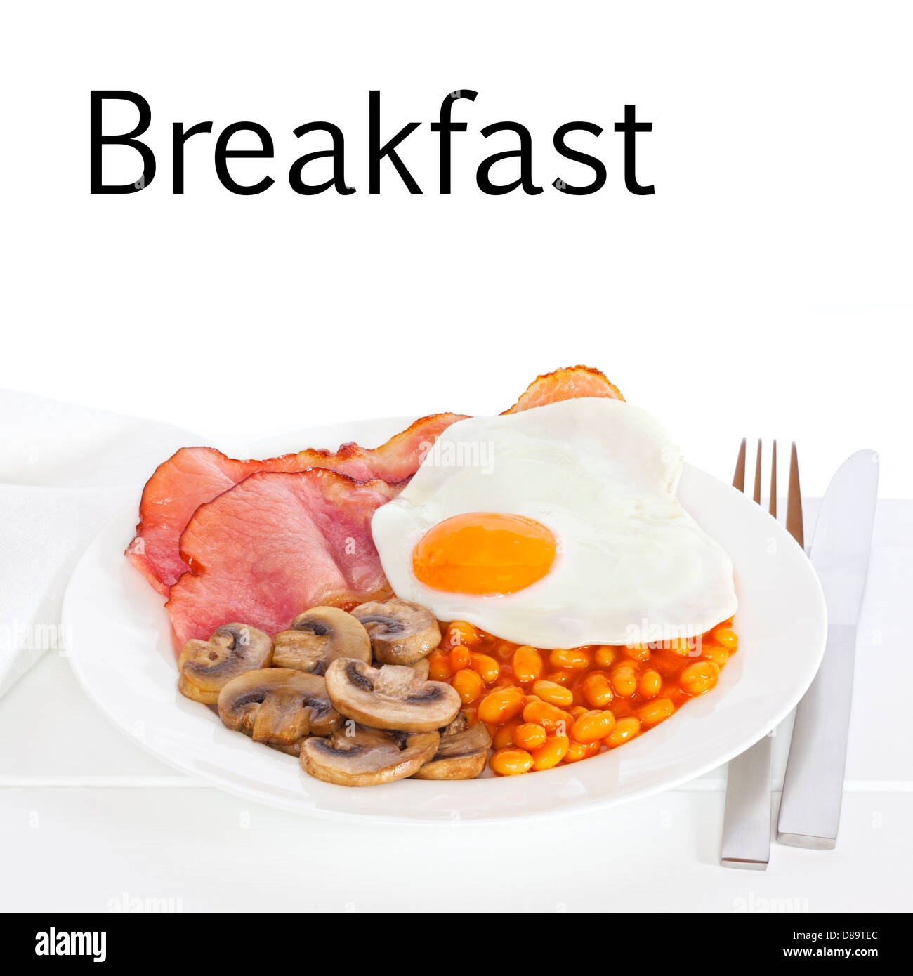 Breakfast English breakfast of bacon, egg, mushrooms and baked beans