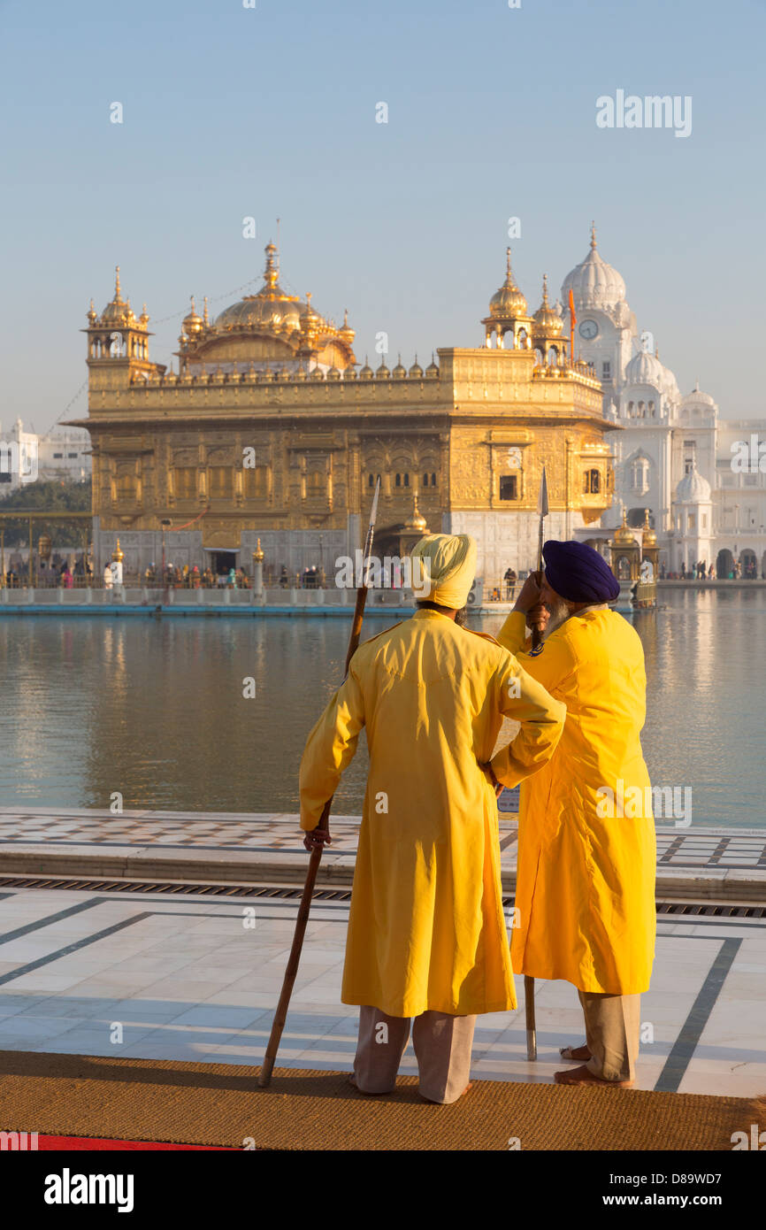 India, Punjab, Amritsar. Golden Temple, Guards Stock Photo