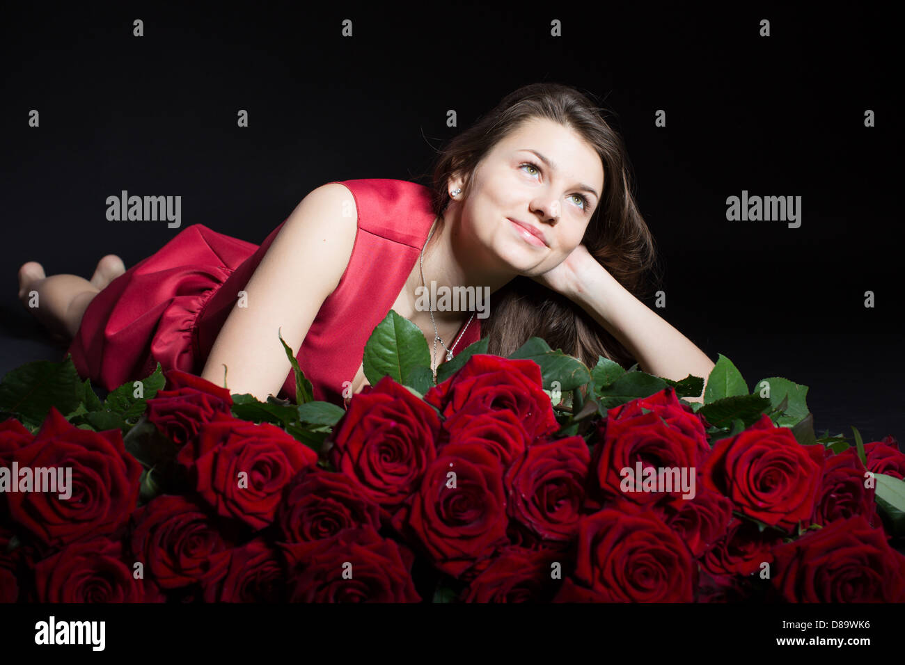 Beautiful girl with roses Stock Photo - Alamy
