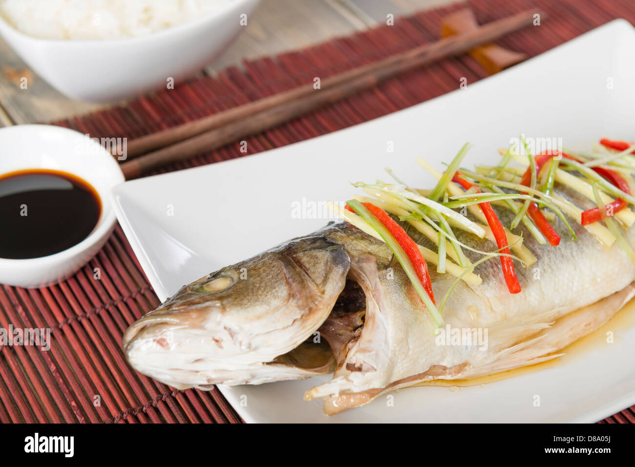 Steamed Fish Chinese style steamed sea bass garnished with ginger