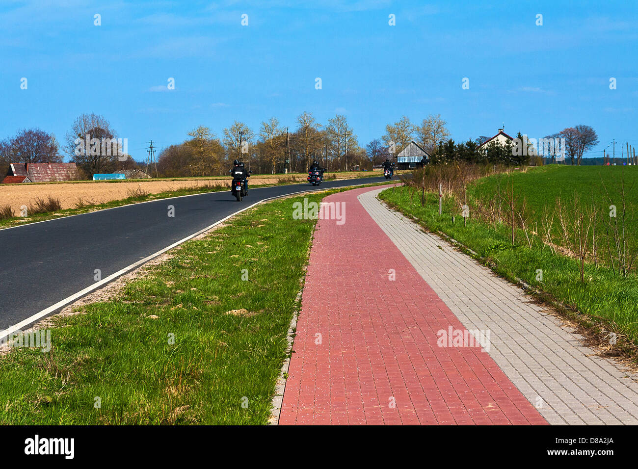 Spring landscape with field and green nature Stock Photo