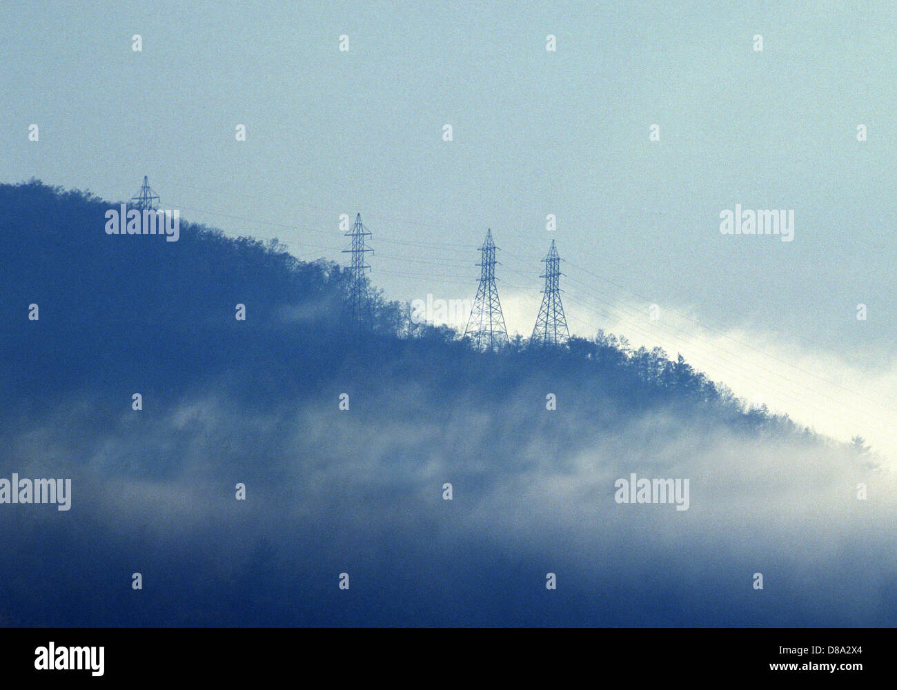 Power lines on hill top Stock Photo - Alamy