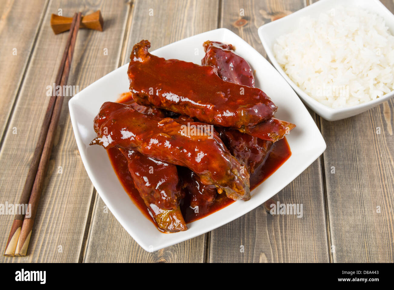 Char Siu - Chinese sticky pork spare ribs roasted with a sweet and savoury sauce. Stock Photo