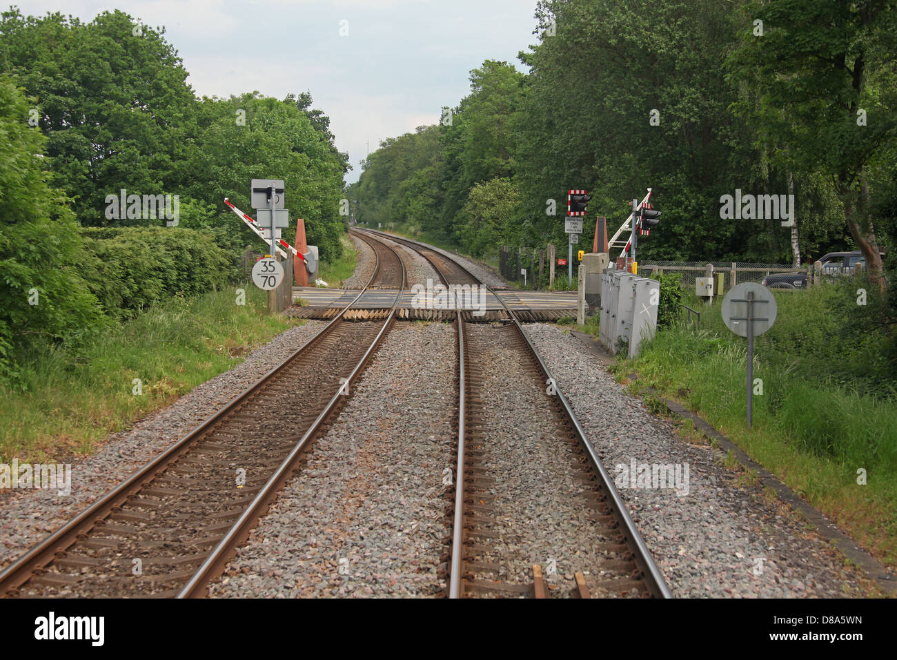 An Automatic Half Barrier Road Level crossing at Tangley Lane to the