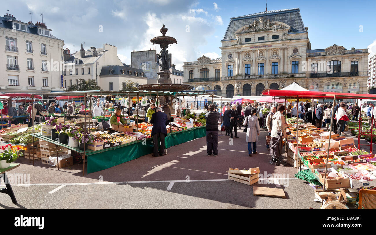Busy weekend shoppers, Cherbourg market square, Normandy, France. The old theatre in background. Stock Photo