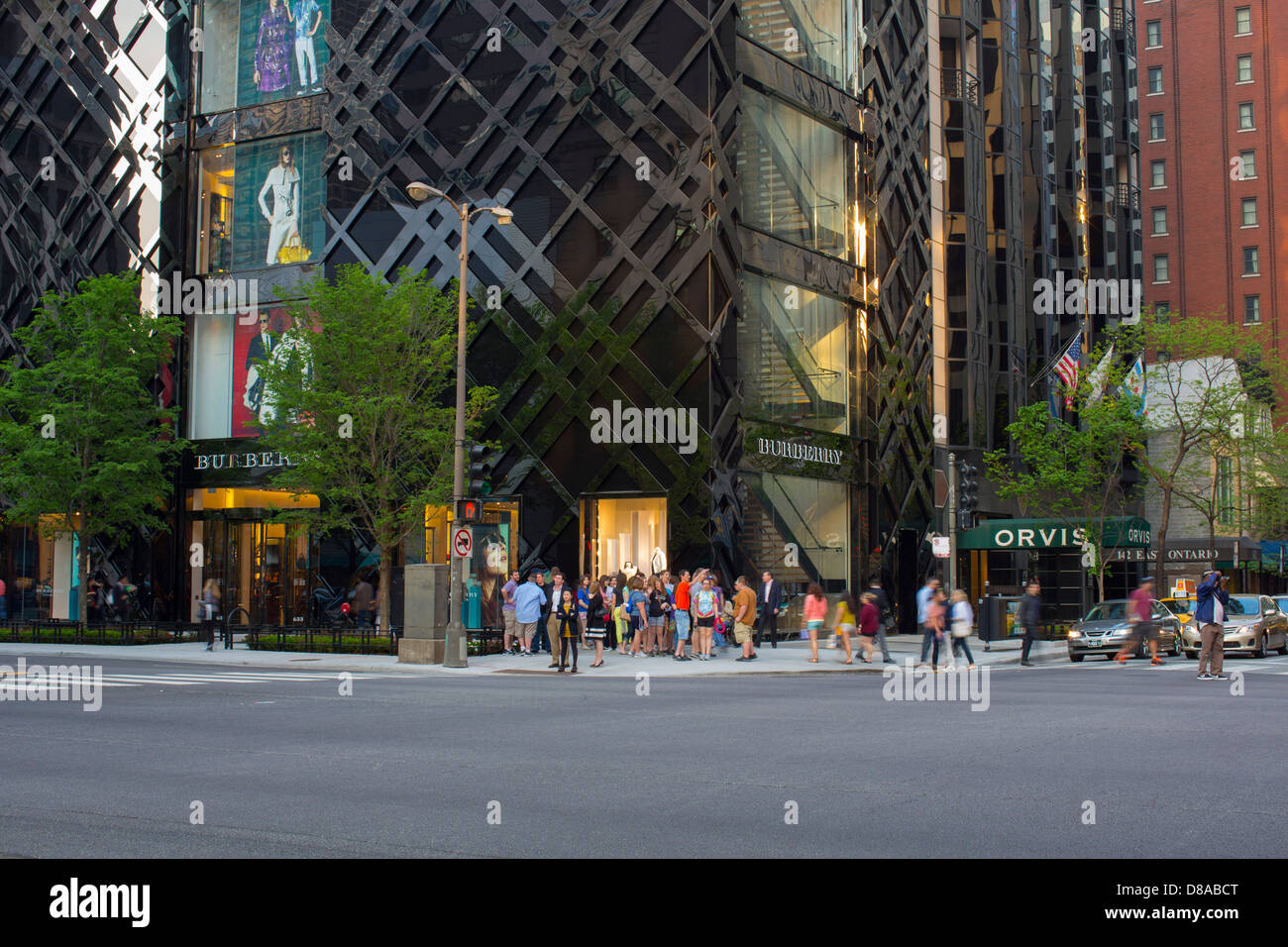 shoppers at the base of the burberry store building in downtown chicago on  michigan avenue during spring season shoppers Stock Photo - Alamy