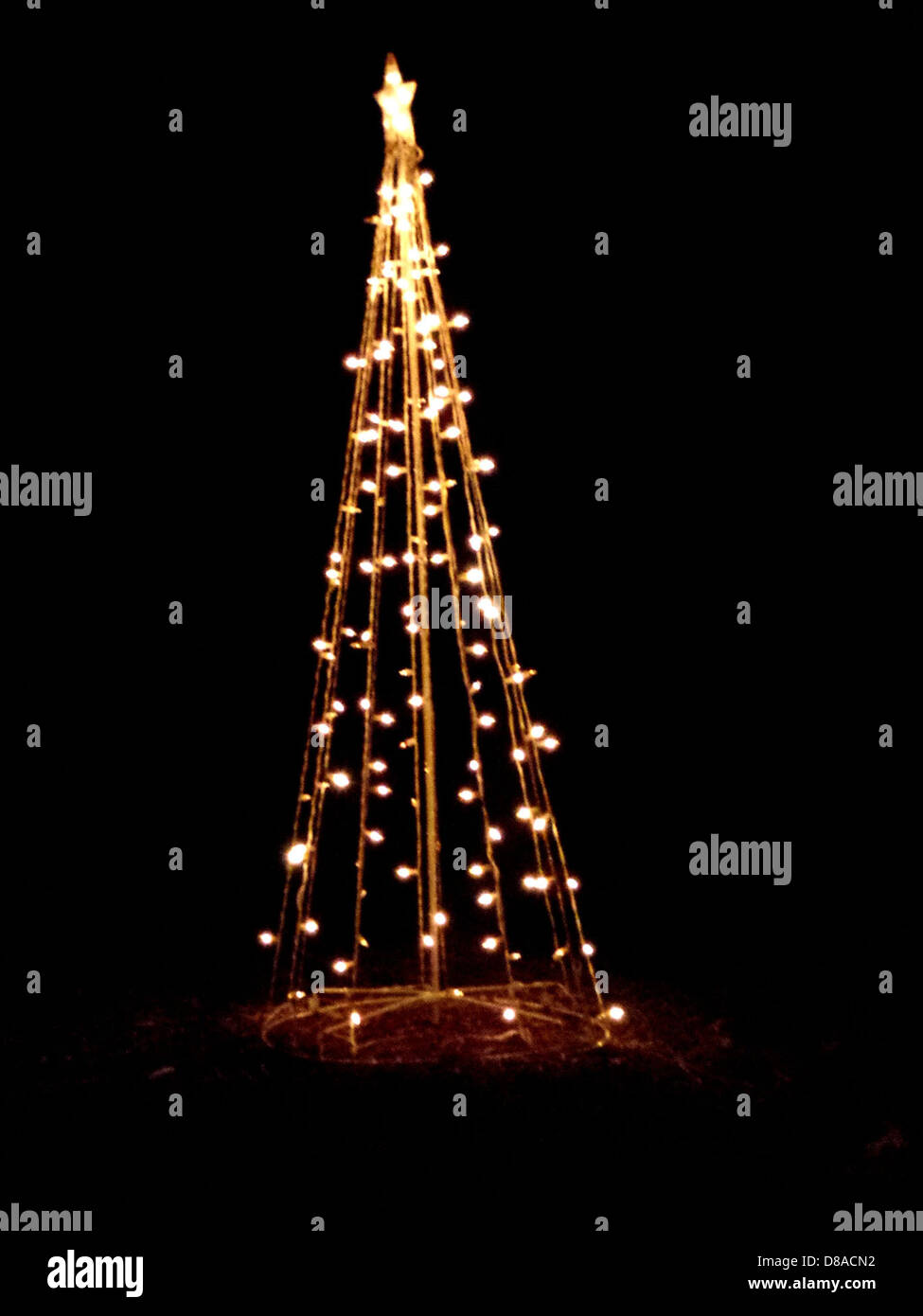 christmas lights shaped like tree holiday yard decoration Stock Photo