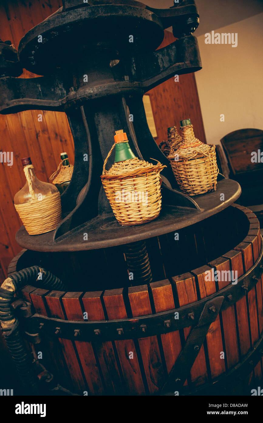 Wine press and barrels in Spanish cellar Stock Photo Alamy