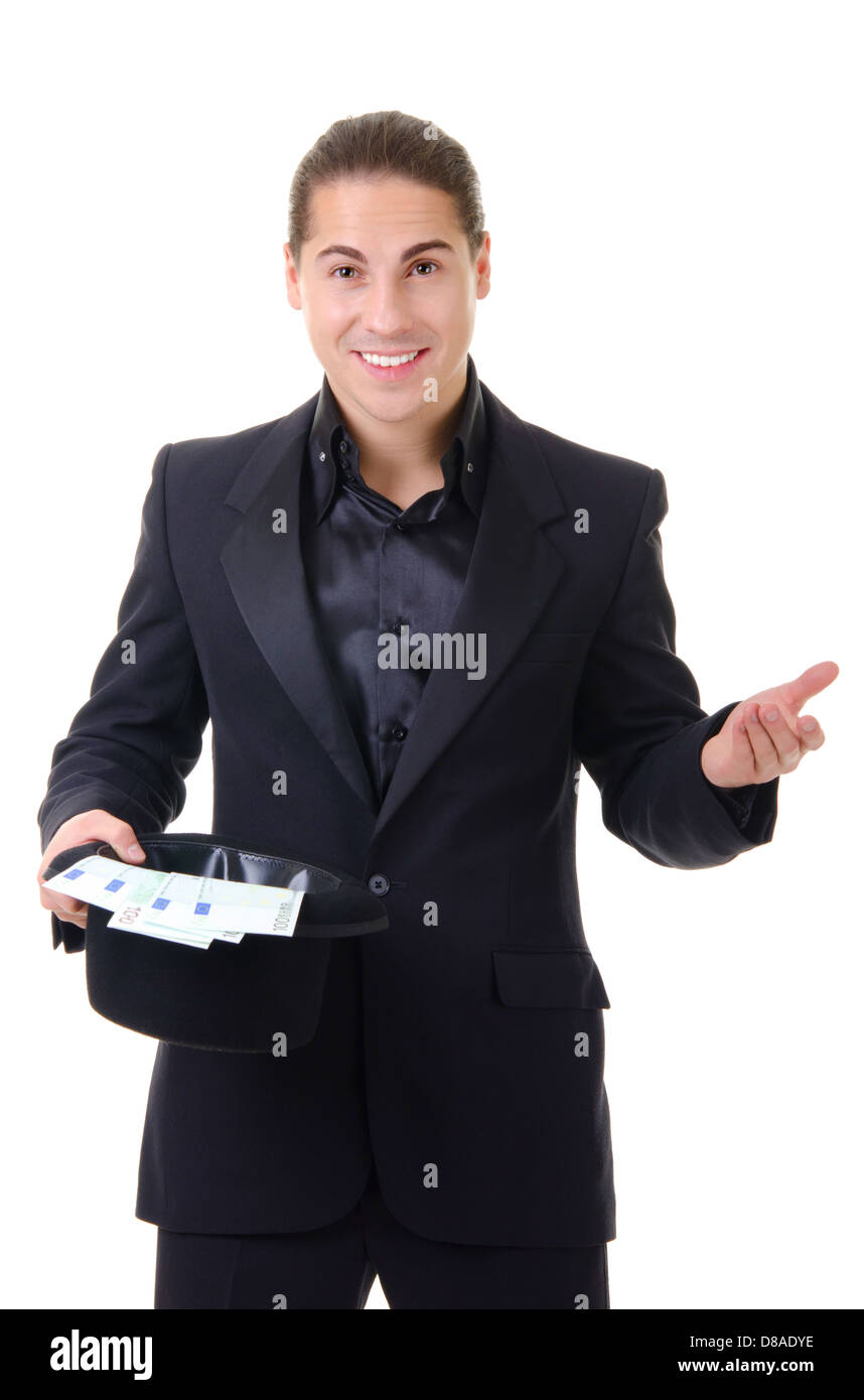 Smiling magician with money in his top hat isolated on white background Stock Photo