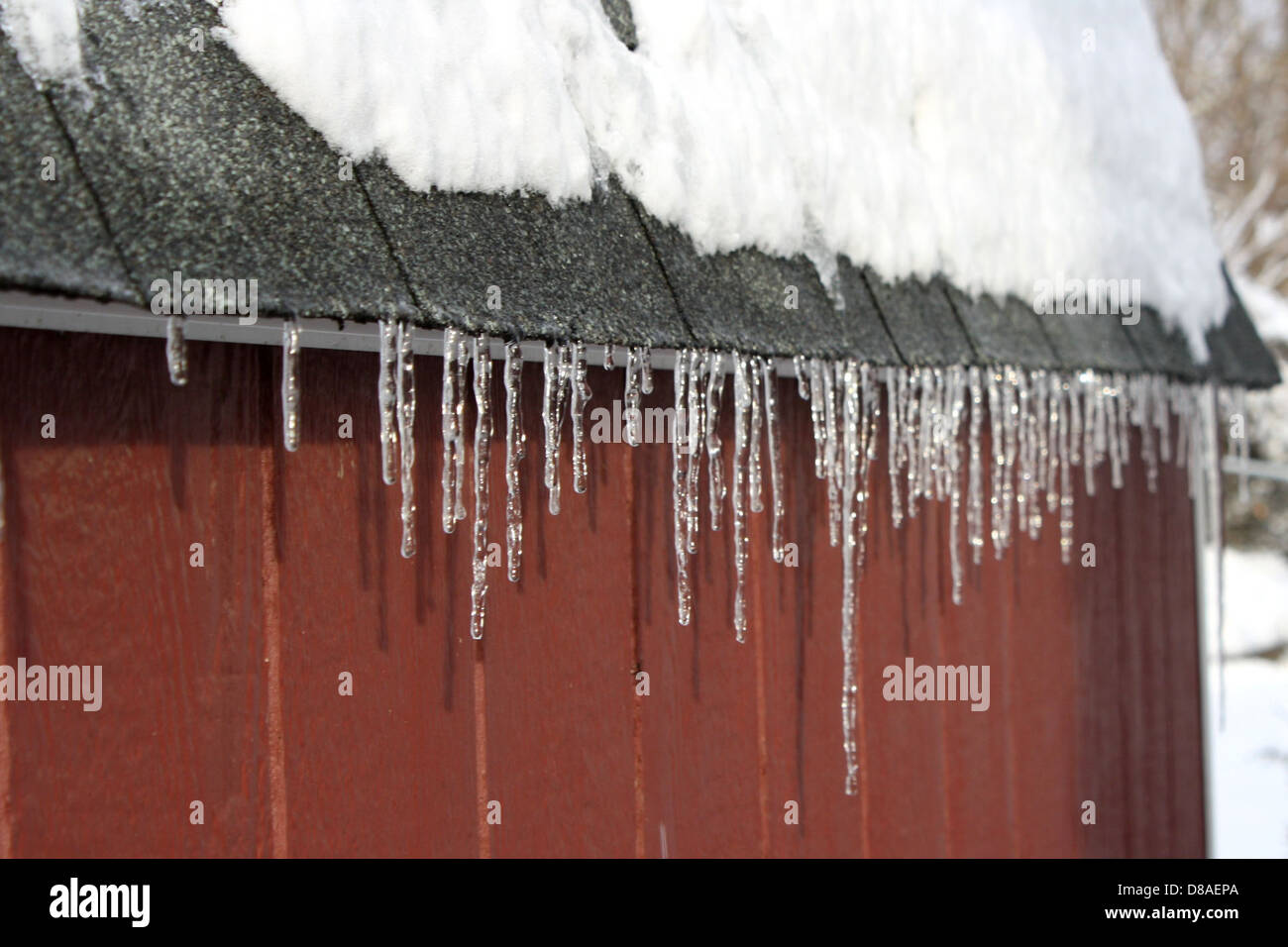 Icicles Hanging Off Roof Stock Photo Alamy