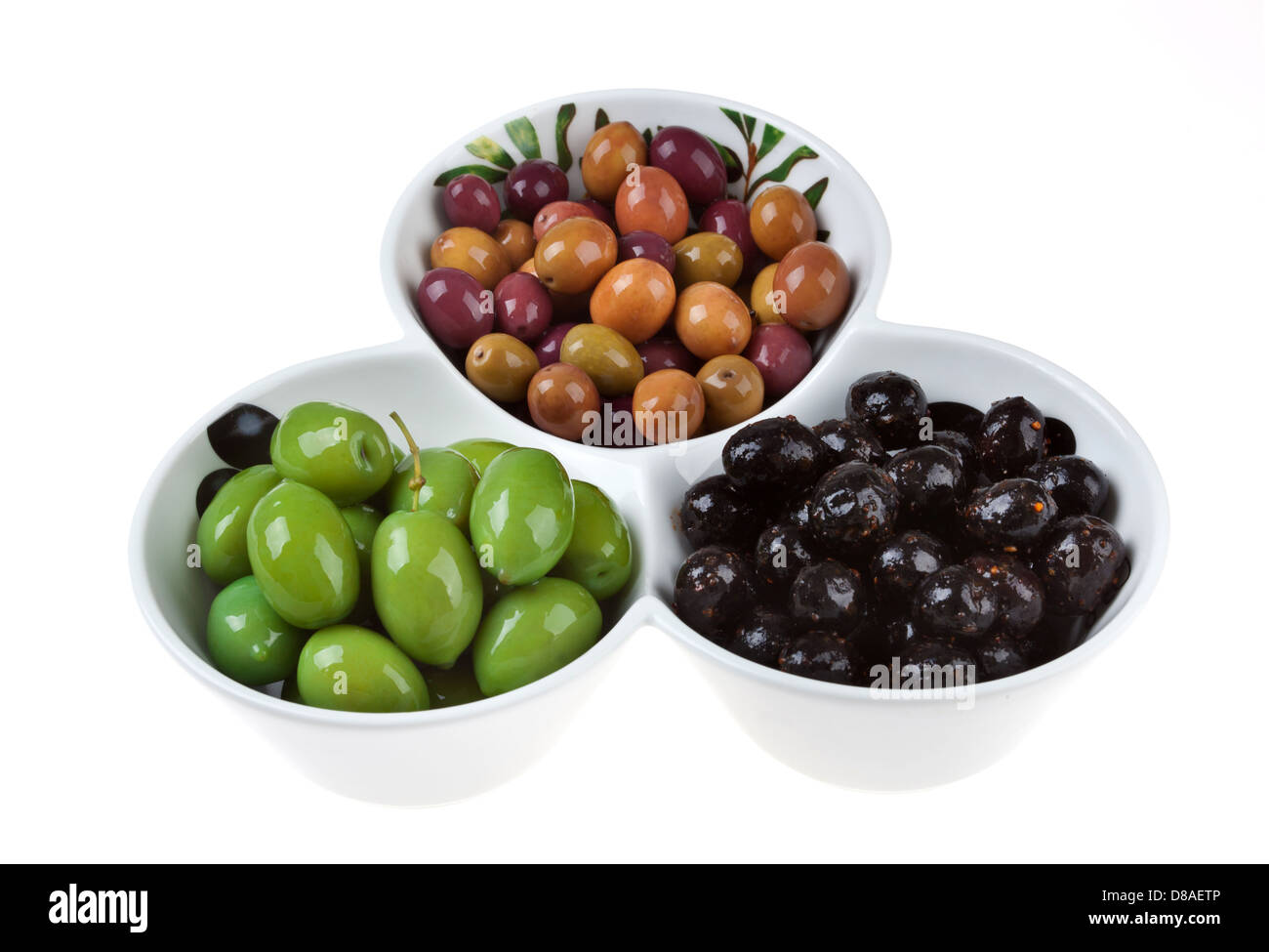 Mixed olives in bowl on white background Stock Photo - Alamy