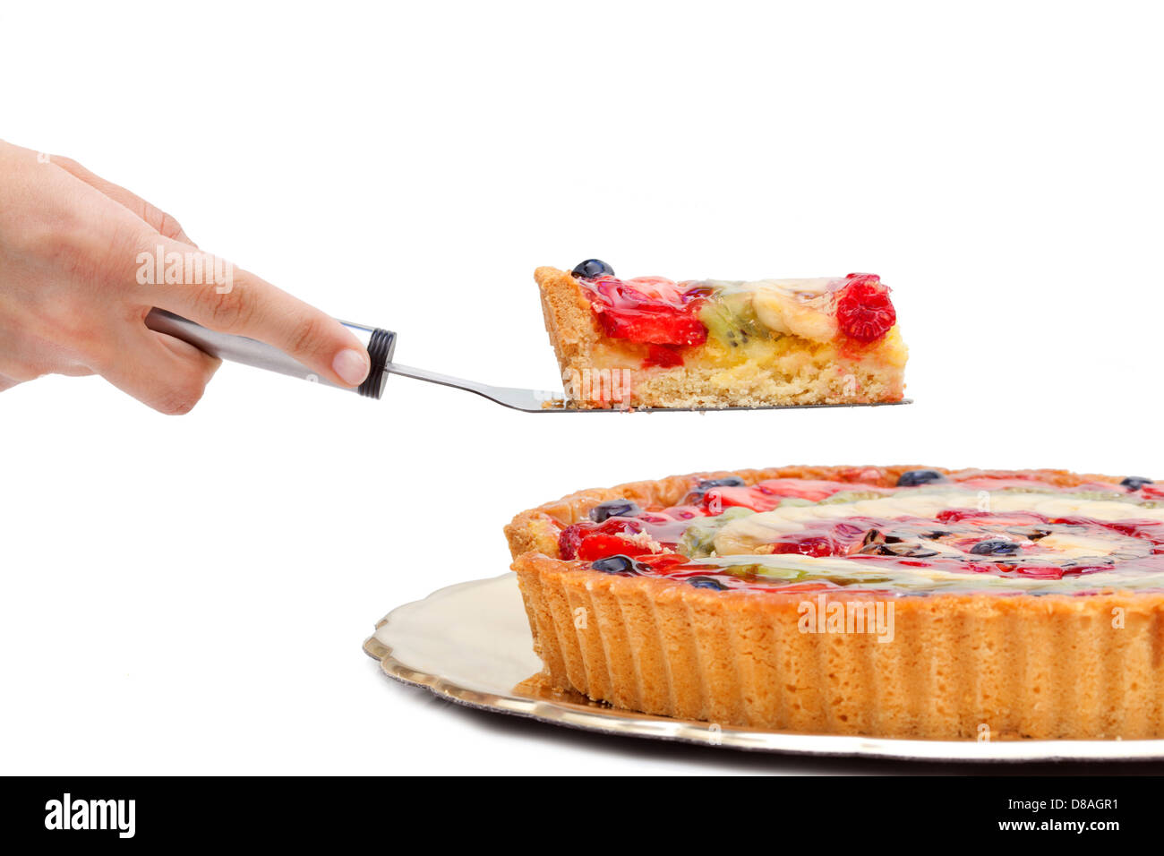 Slice of fruit cake on white background Stock Photo