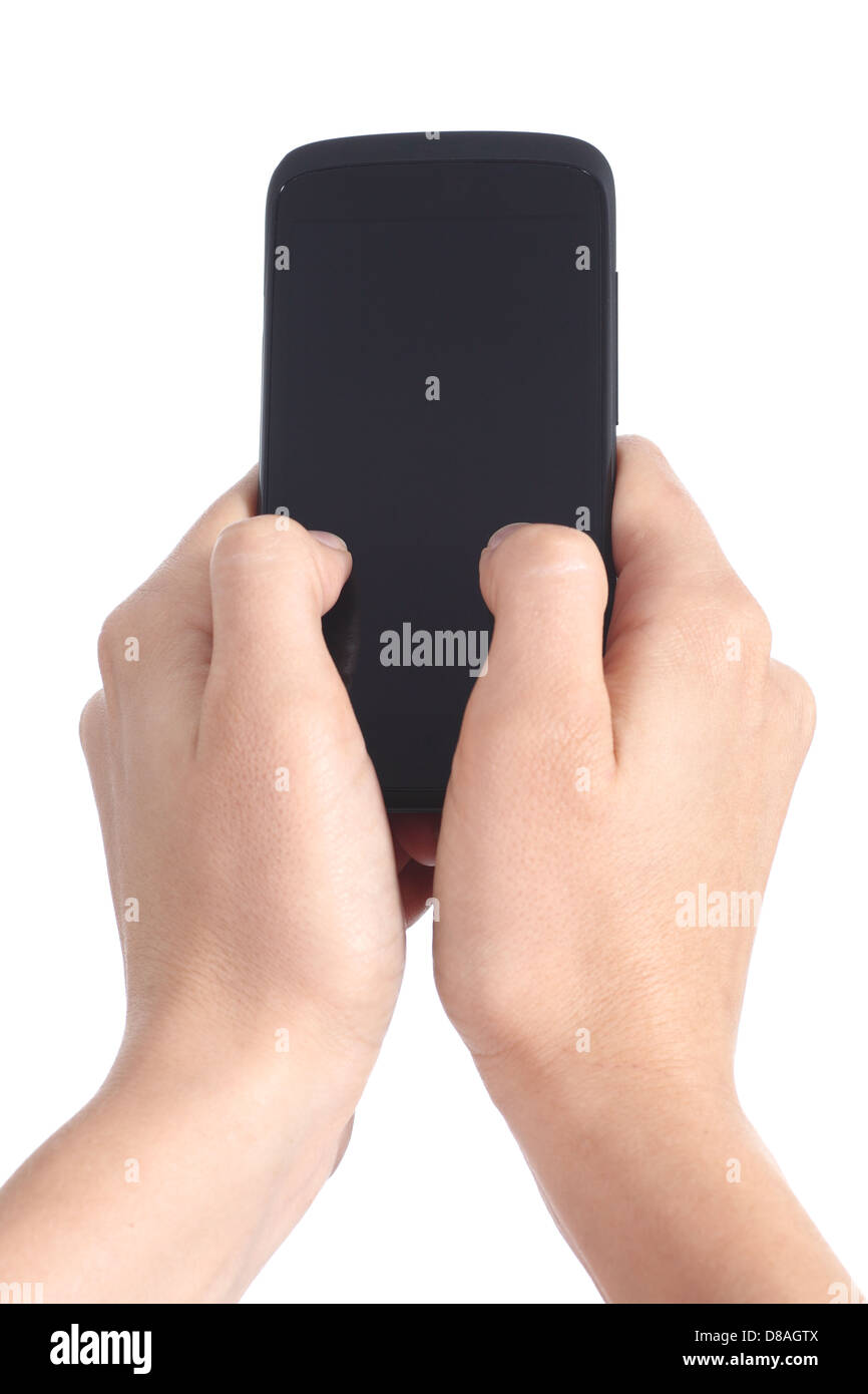 Woman hands holding and touching a mobile phone screen with her thumbs isolated on a white background Stock Photo