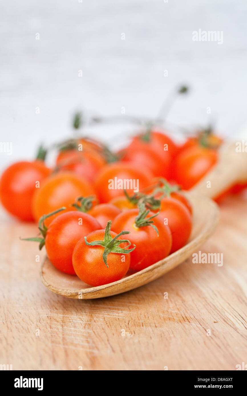Mixed types of heritage tomatoes in styled shots. Stock Photo
