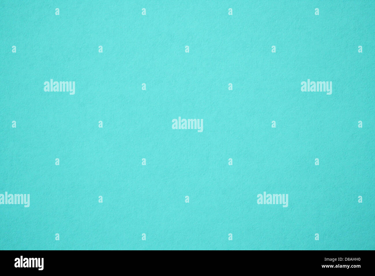 A close-up of turquoise paper texture, showcasing its smooth surface ...