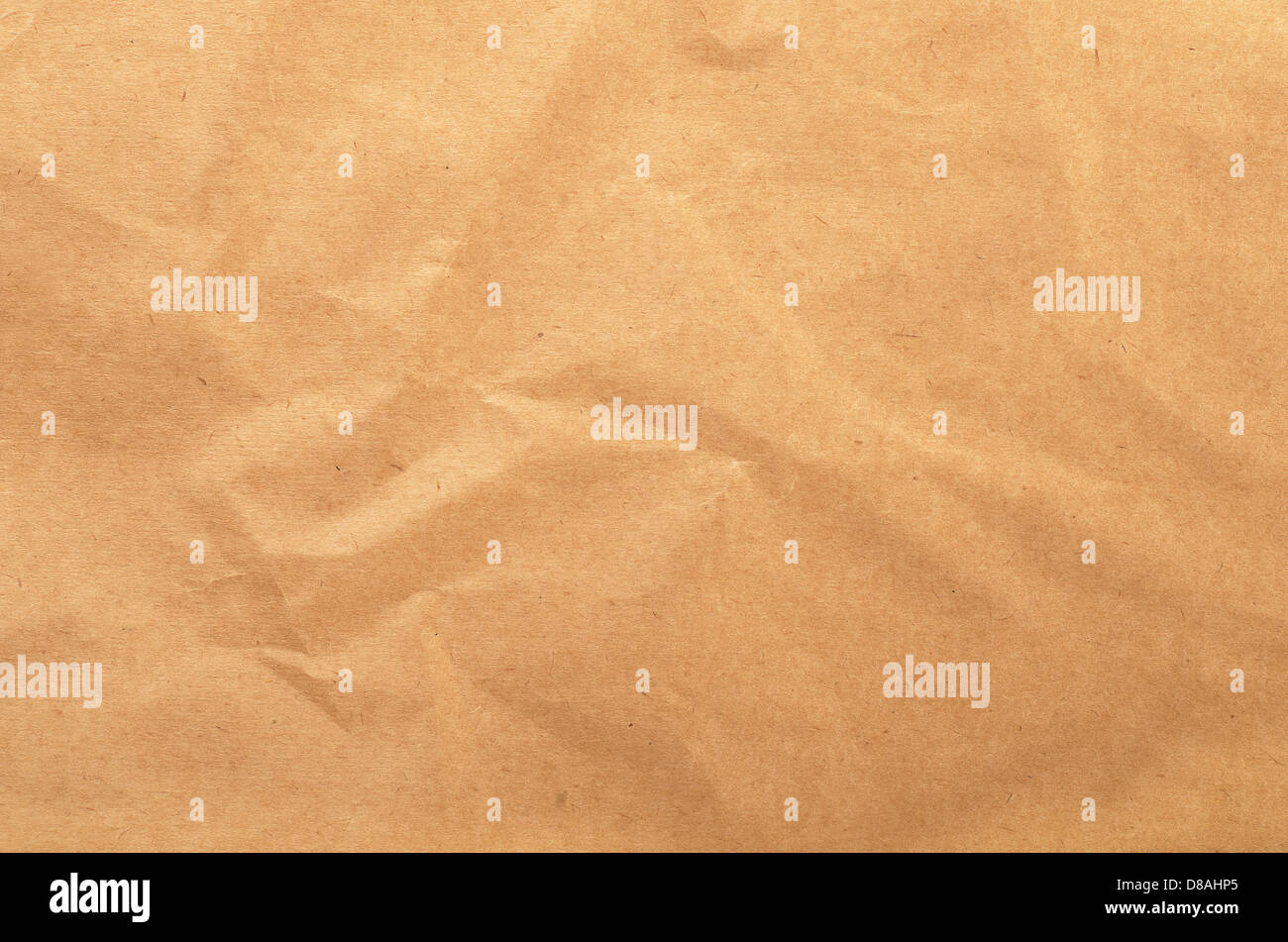 Brown rough crumpled recycled paper texture Stock Photo