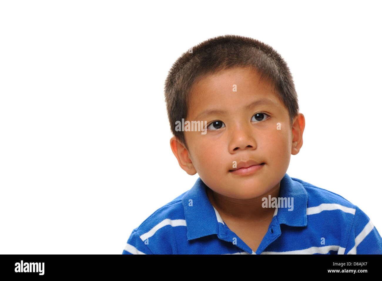 Asian boy wearing blue shirt looking cute and happy Stock Photo Alamy