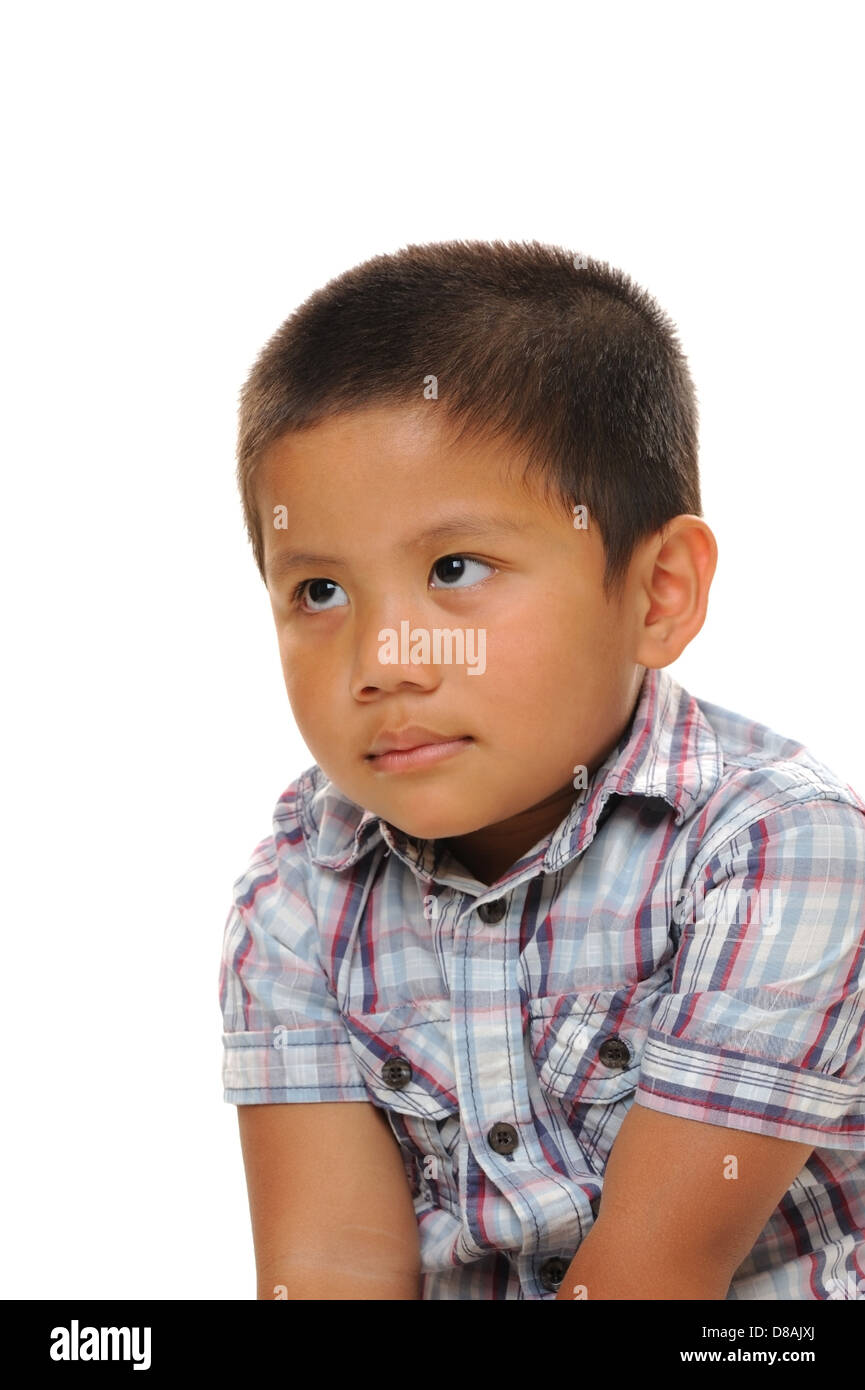 Asian boy wearing fashionable shirt staring into space Stock Photo - Alamy