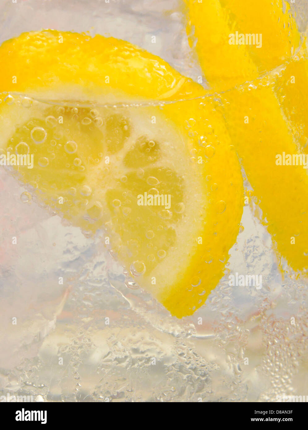 Lemon slices in cold water, Formentera, Balearic Islands, Spain Stock Photo