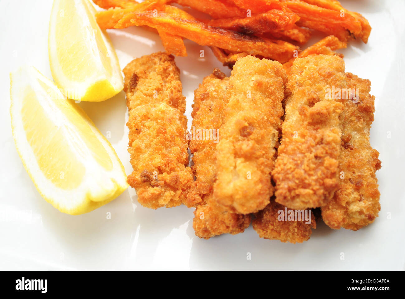 Fish Sticks with Lemon Slices on the Side Stock Photo Alamy