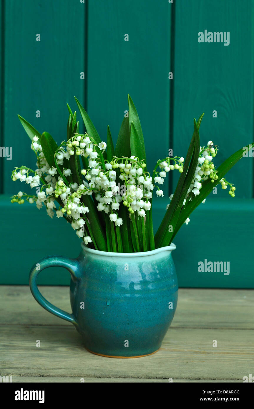 A vase of lily of the valley Stock Photo - Alamy