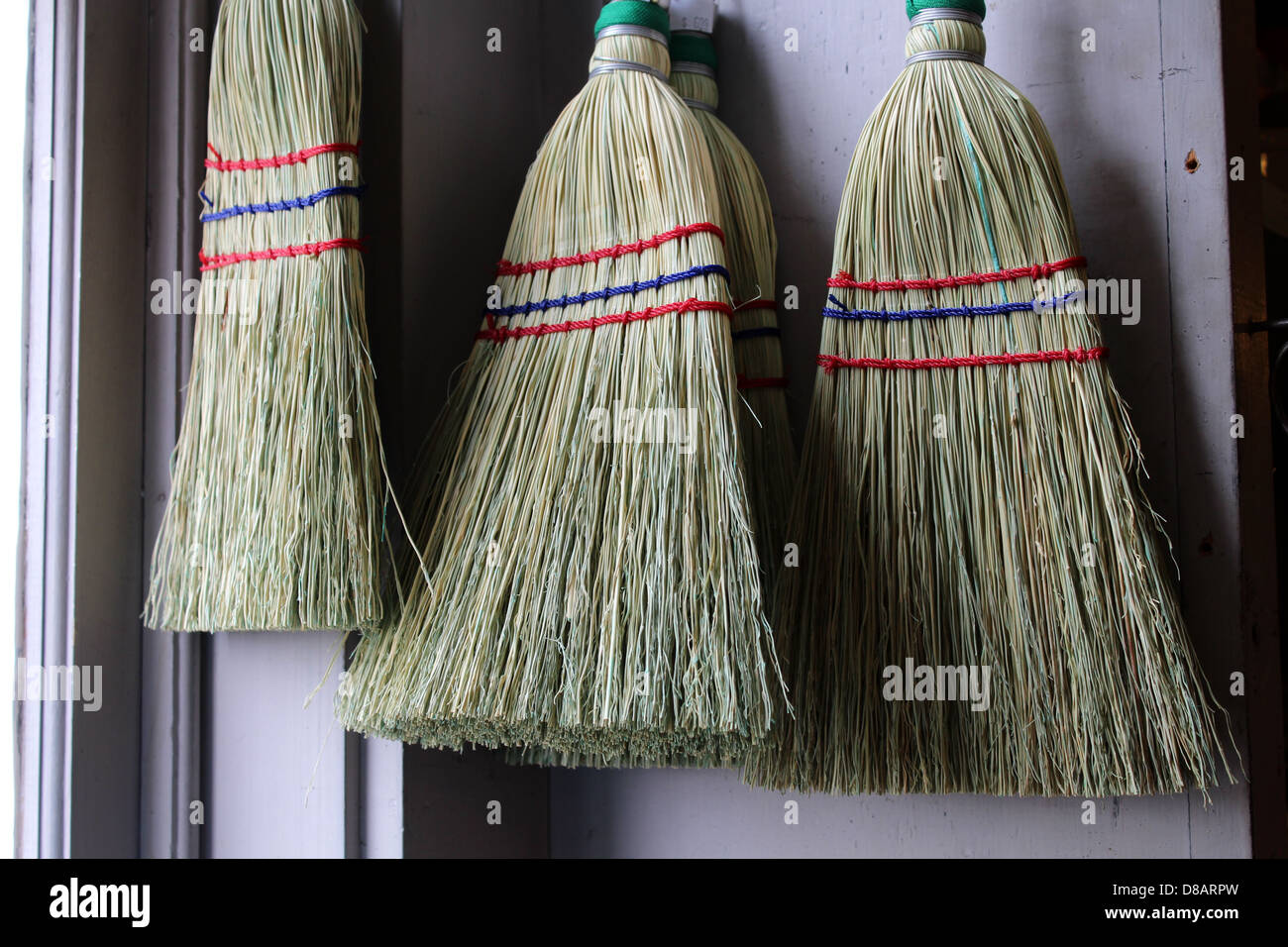 Hand made whisk brooms is an art steeped in history. Stock Photo