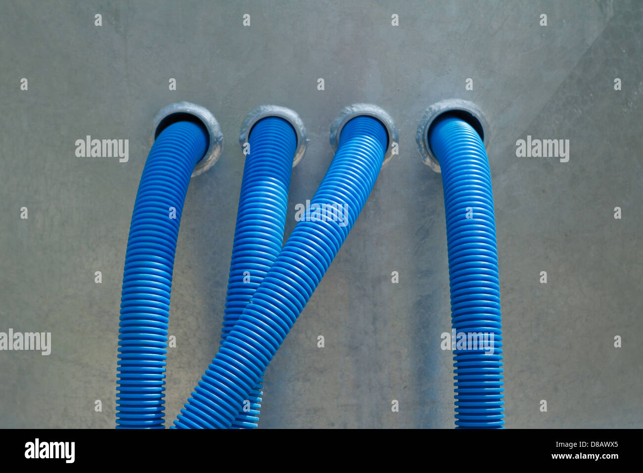 Blue ribbed flexible plastic pipes Stock Photo Alamy