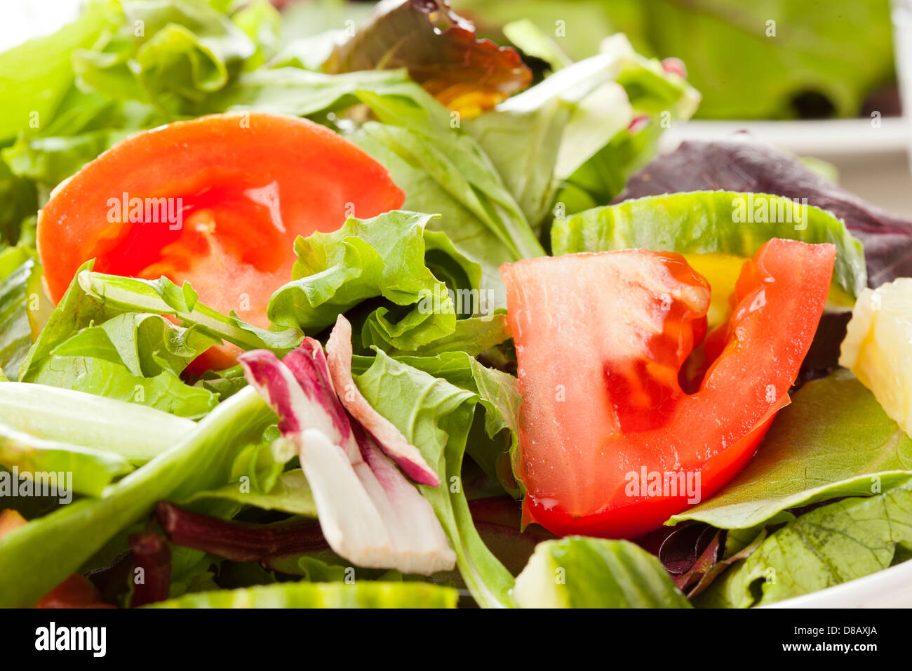 Fresh Green Organic Garden Salad on a background Stock Photo - Alamy