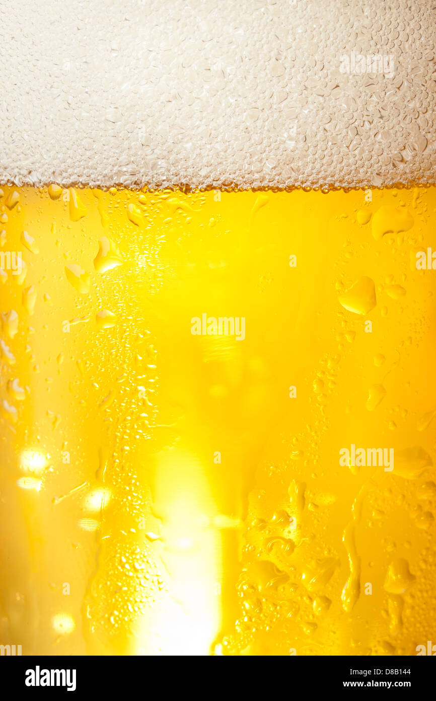 Refreshing Ice Cold Beer against a background Stock Photo Alamy