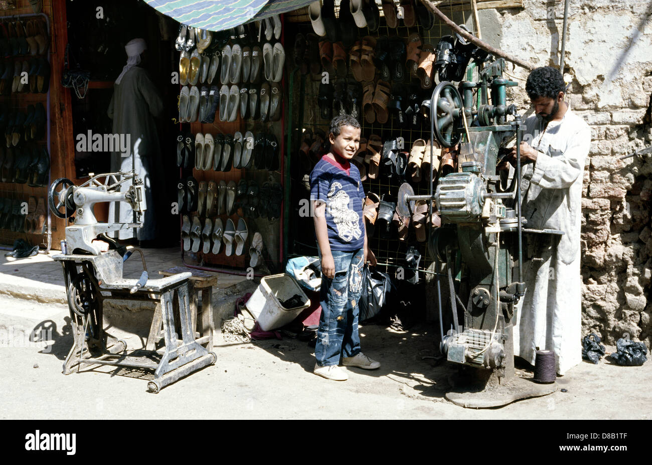 Shoemaker in the souks of Luxor in Egypt. Stock Photo