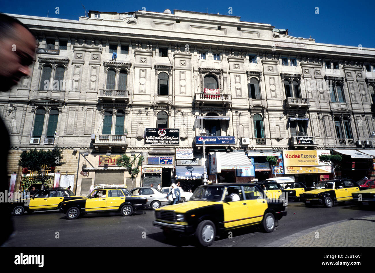 Taxis on Midan Orabi (Orabi Square) in Egyptian Alexandria. Stock Photo