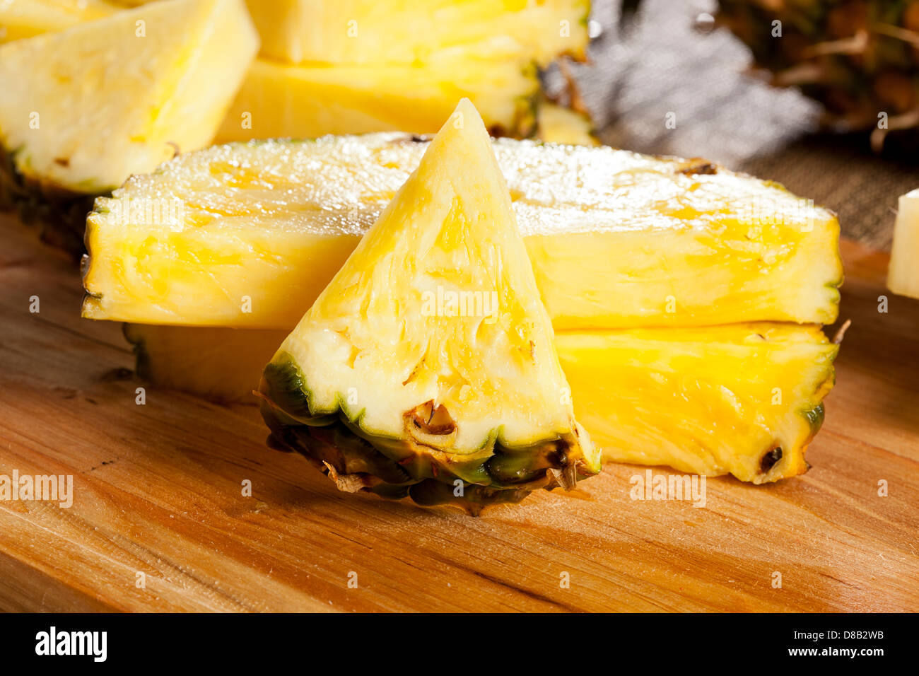 Fresh Yellow Organic Pineapple cut into slices Stock Photo Alamy