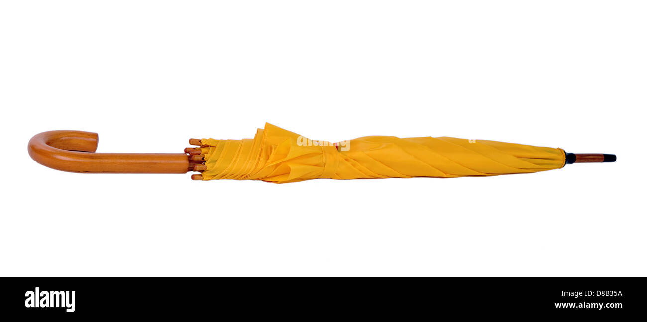 closed yellow umbrella isolated on white background Stock Photo - Alamy