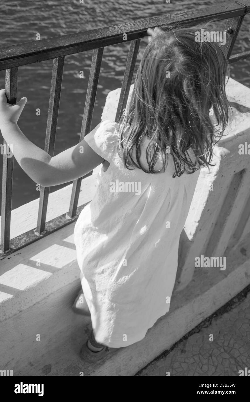 Child in white dress Black and White Stock Photos & Images - Alamy