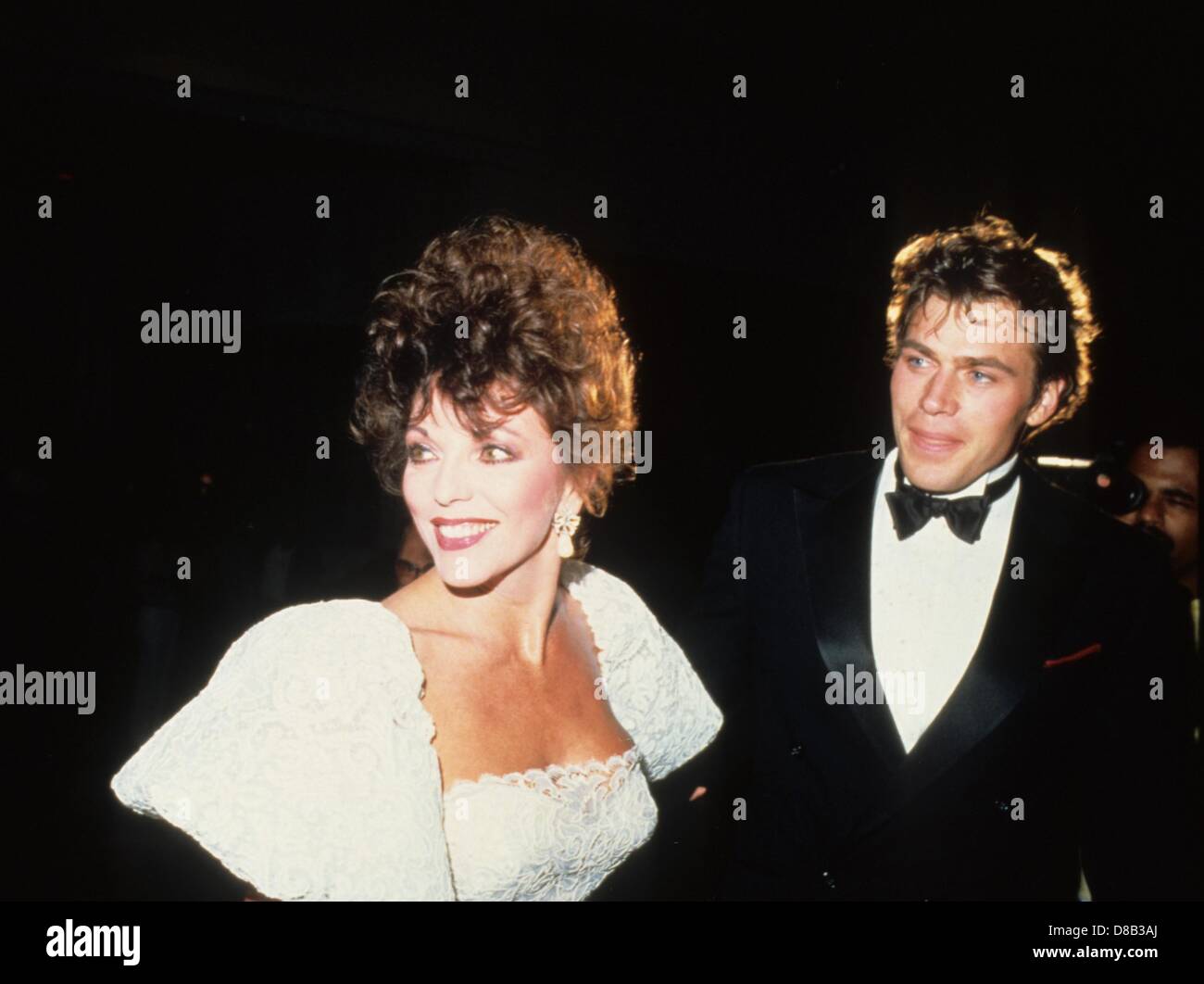 JON ERIK HEXUM with Joan Collins.e9961b.Supplied by   Photos, inc.(Credit Image: © Supplied By Globe Photos, Inc/Globe Photos/ZUMAPRESS.com) Stock Photo