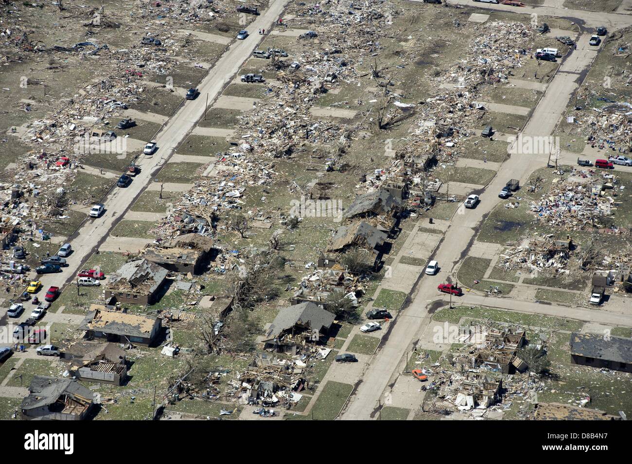 Aerial view of the path of destruction in the aftermath of an EF-5 tornado that destroyed the town May 22, 2013 in Moore, Oklahoma. The massive storm with winds exceeding 200 miles per hour tore through the Oklahoma City suburb May 20, 2013, killing at least 24 people, injuring more than 230 and displacing thousands. Stock Photo