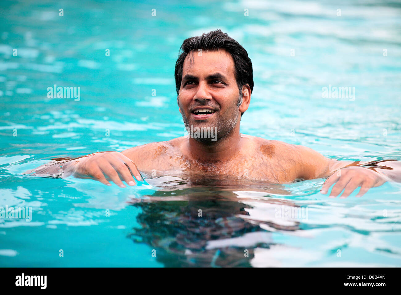 Fun at the pool Stock Photo - Alamy