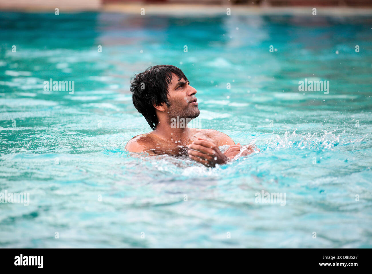 Fun at the pool Stock Photo - Alamy