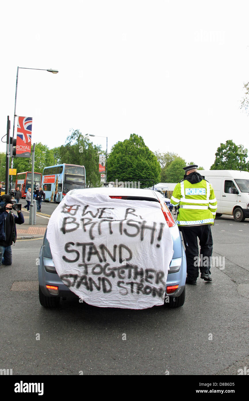 Car with British banner near Woolwich barracks. The occupants were asked to remove the banner by