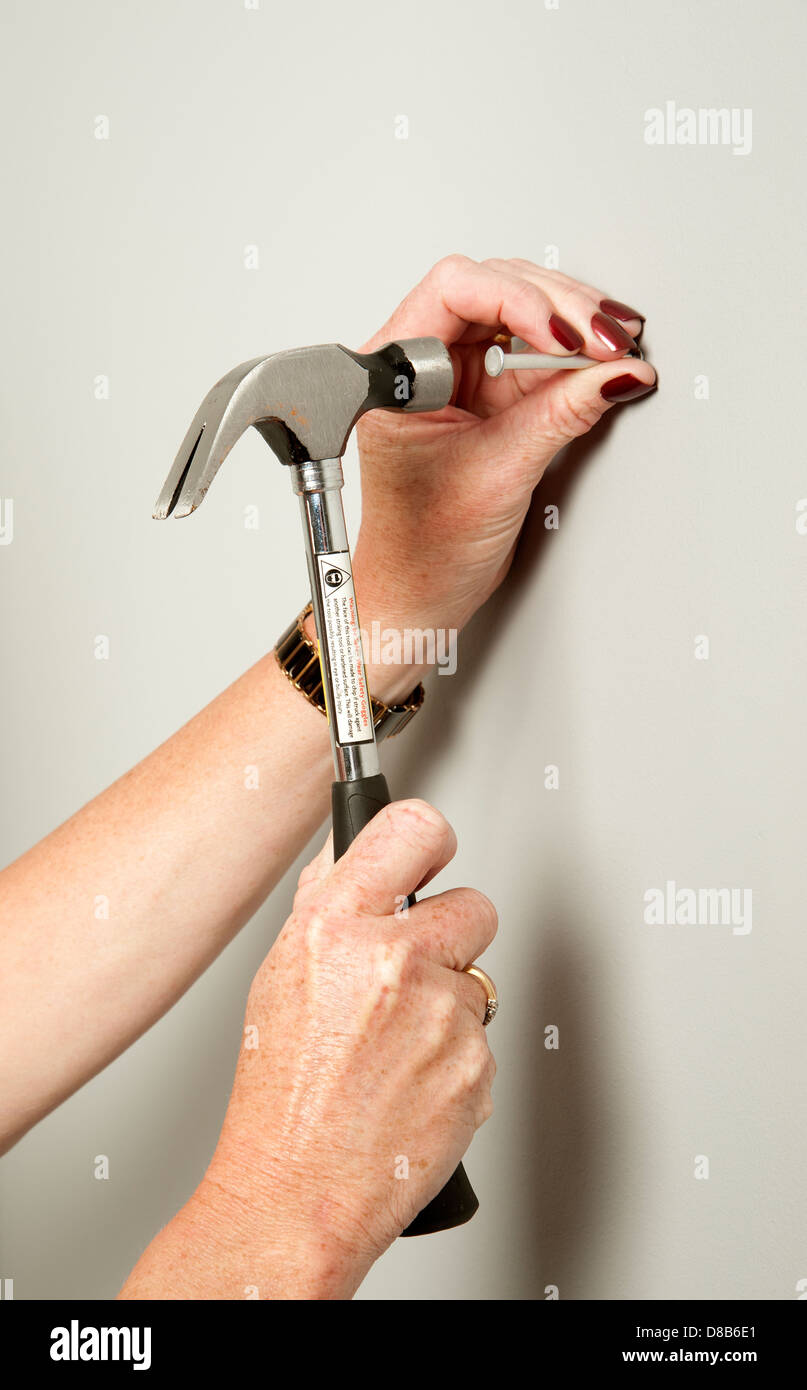 Banging hammer hi-res stock photography and images - Alamy