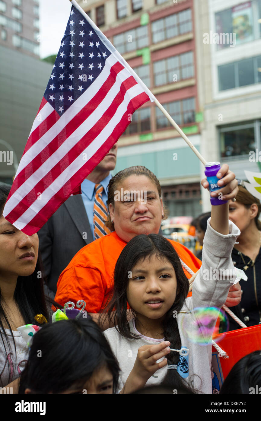 Immigrant families and their supporters rally for immigration reform to keep families together in Union Square Park in New York Stock Photo