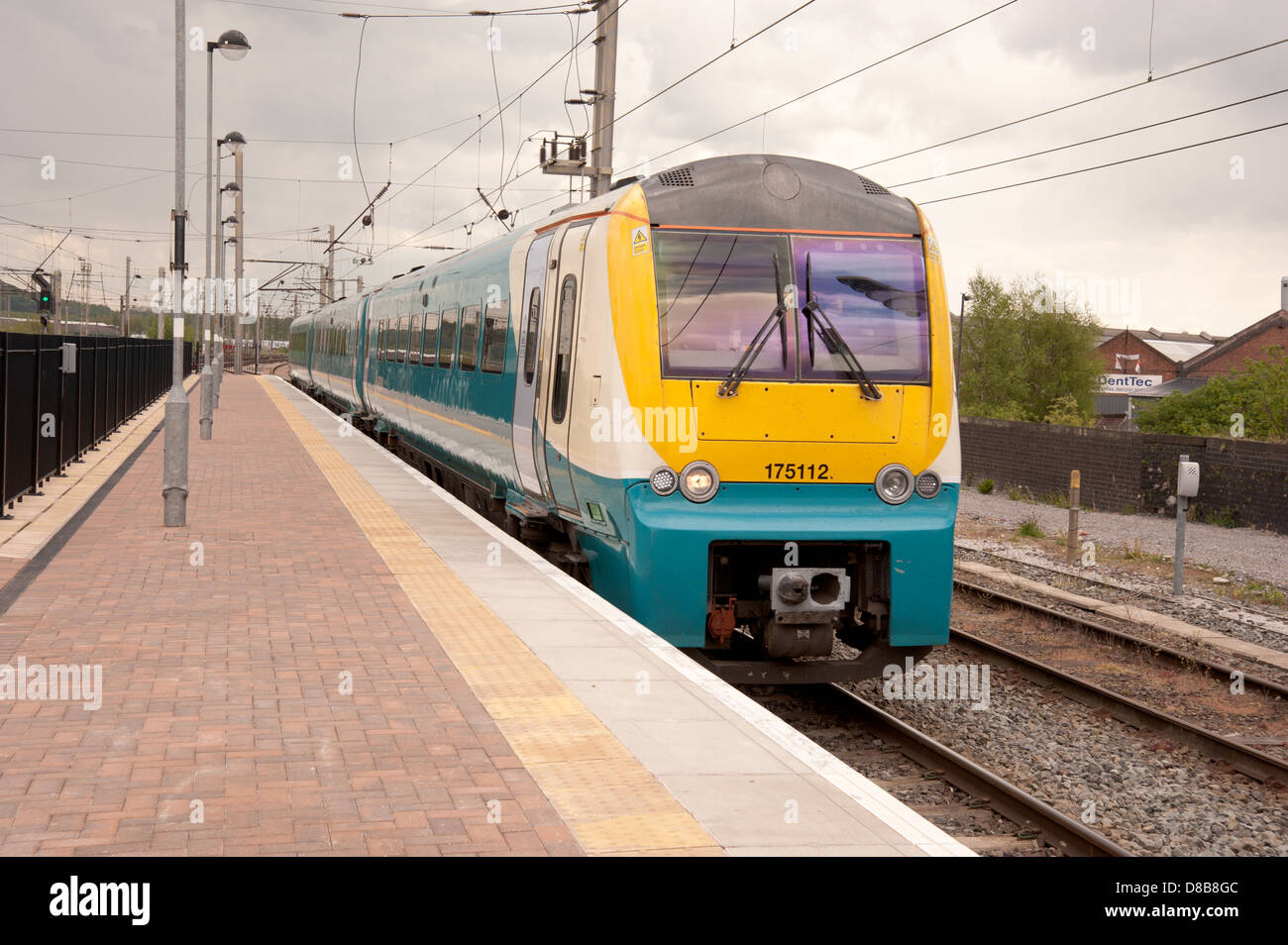 Arriva trains Wales train arriving at Warrington Bank Quay Station Stock Photo