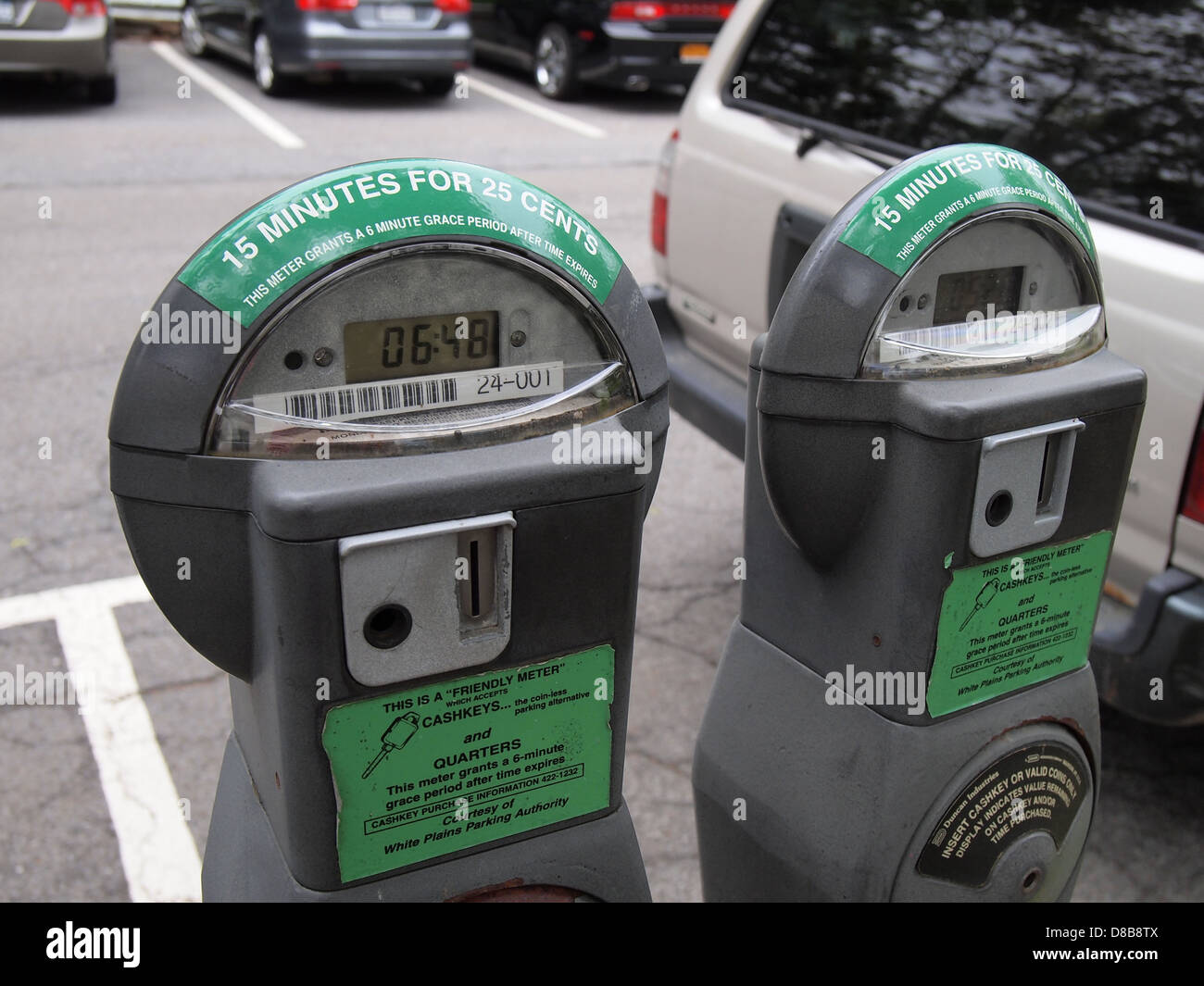 Coin operated parking meters near a commuter train station, White Plains, New  York, USA, May 22, 2013, © Katharine Andriotis Stock Photo - Alamy