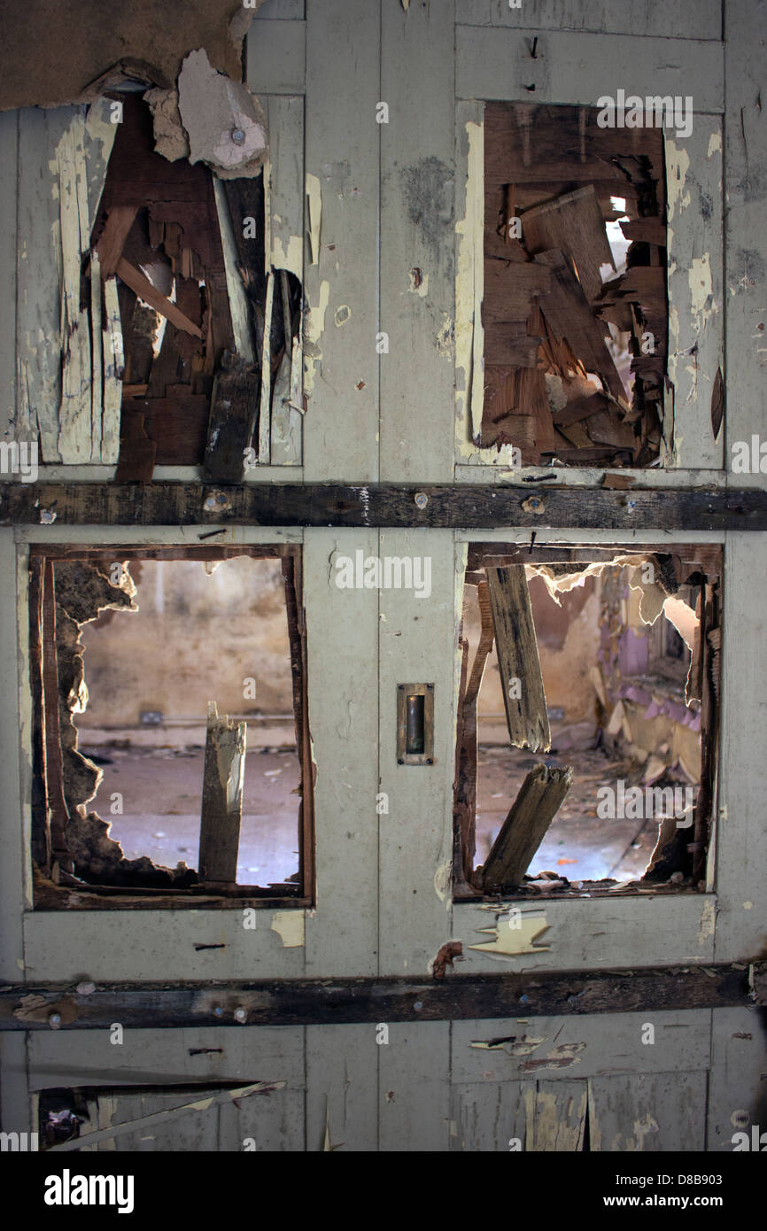 A Broken Door in an abandoned hospital. Stock Photo