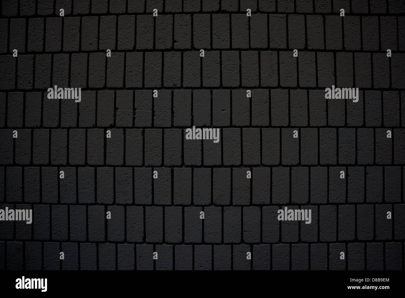 black brick wall texture with vertical bricks Stock Photo - Alamy